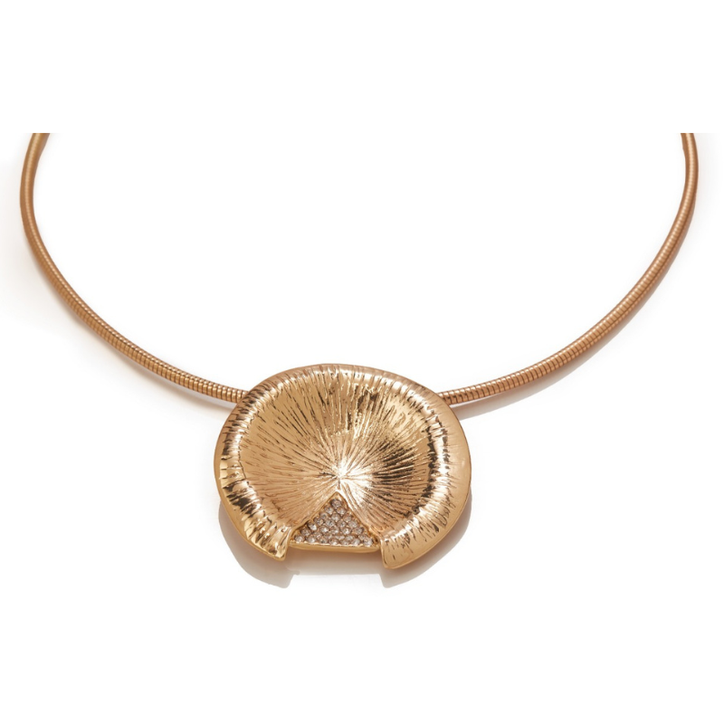 modern gold pendant necklace on white background