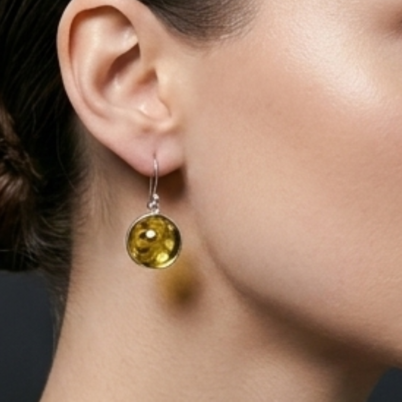 Close-up of ethically sourced natural citrine bezel-set in hallmarked 925 sterling silver. Hypoallergenic and nickel-free silver jewelry designed for comfort and everlasting brilliant shine.