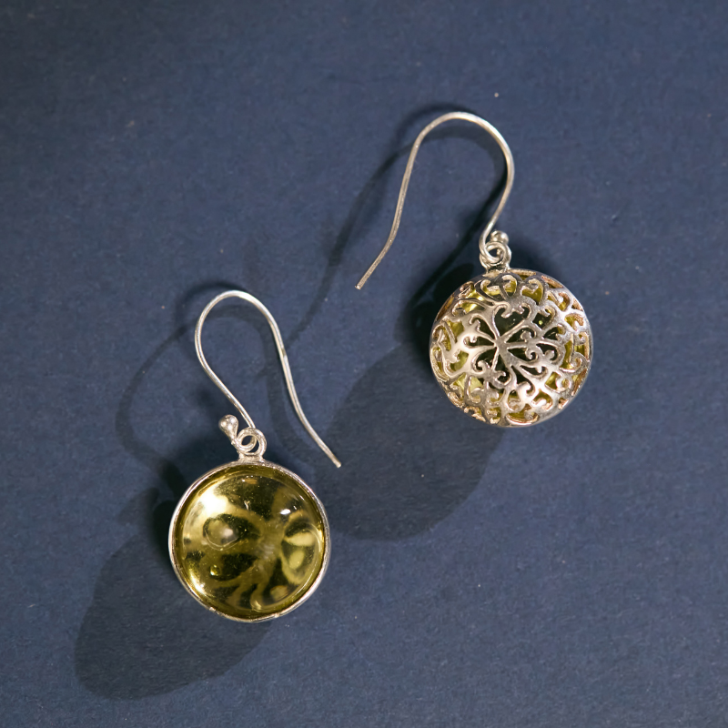 Natural citrine gemstone earrings in solid 925 silver. Known as the 'Success Stone,' these vibrant yellow citrine drops bring a glow of positivity and artisanal elegance to any outfit.